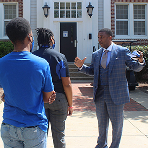 Chancellor at dorm with students