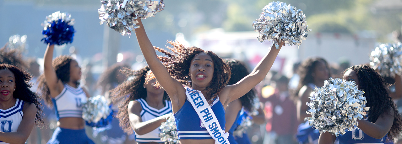 Cheerleaders during the homecoming parade