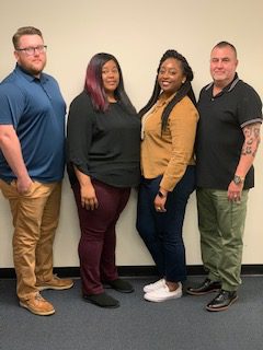 Students in the photo are: Anthony Cogar, Lashanda Greene, Adriana Londono, and Jose Cañas