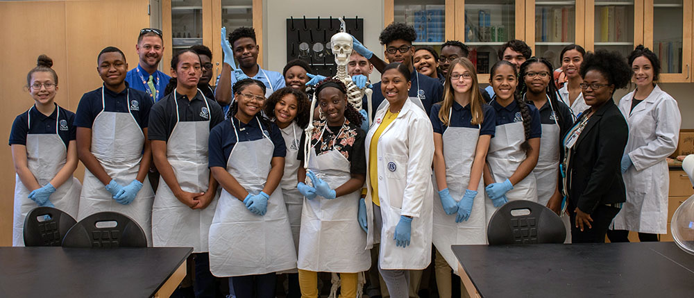 Dr. Danielle Graham and students from Alpha Academy