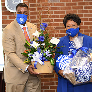 flower presentation to Mrs. Allie Harlow