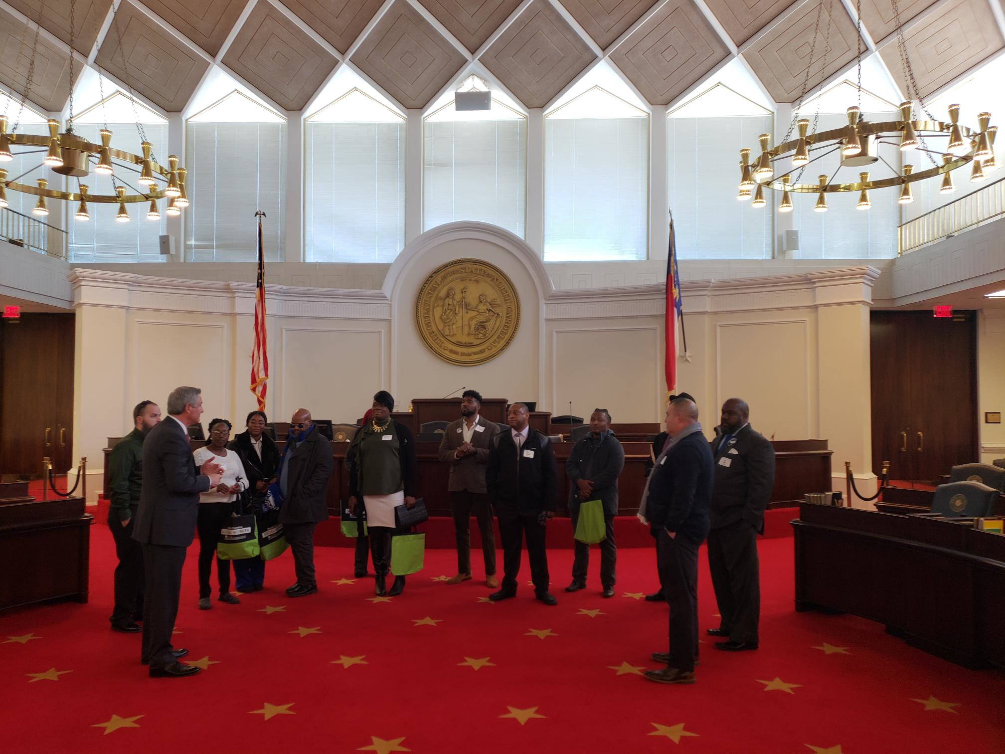 Students speak with state representatives.